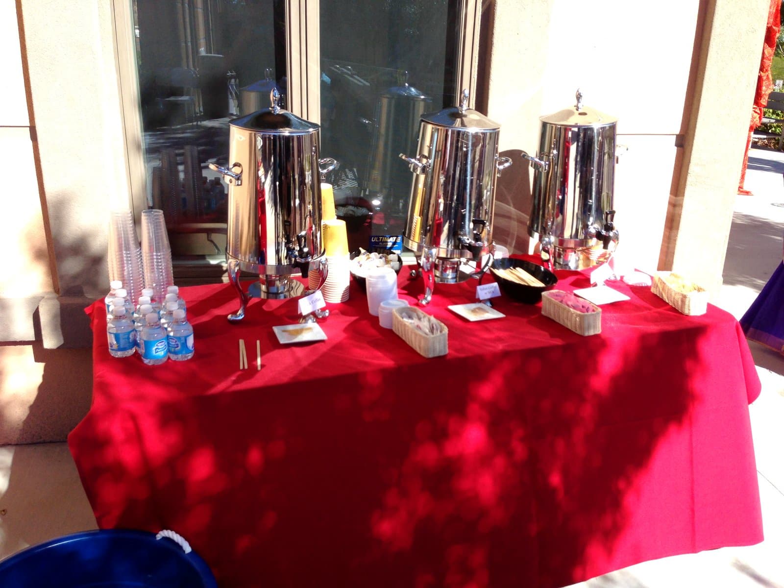 Beverage station with samovars at a Mint Indian Bistro outdoor catering event