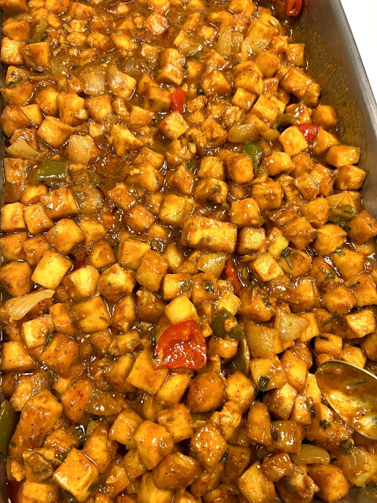 Chilli paneer in a full-size chafing tray at Mint Indian Bistro catering
