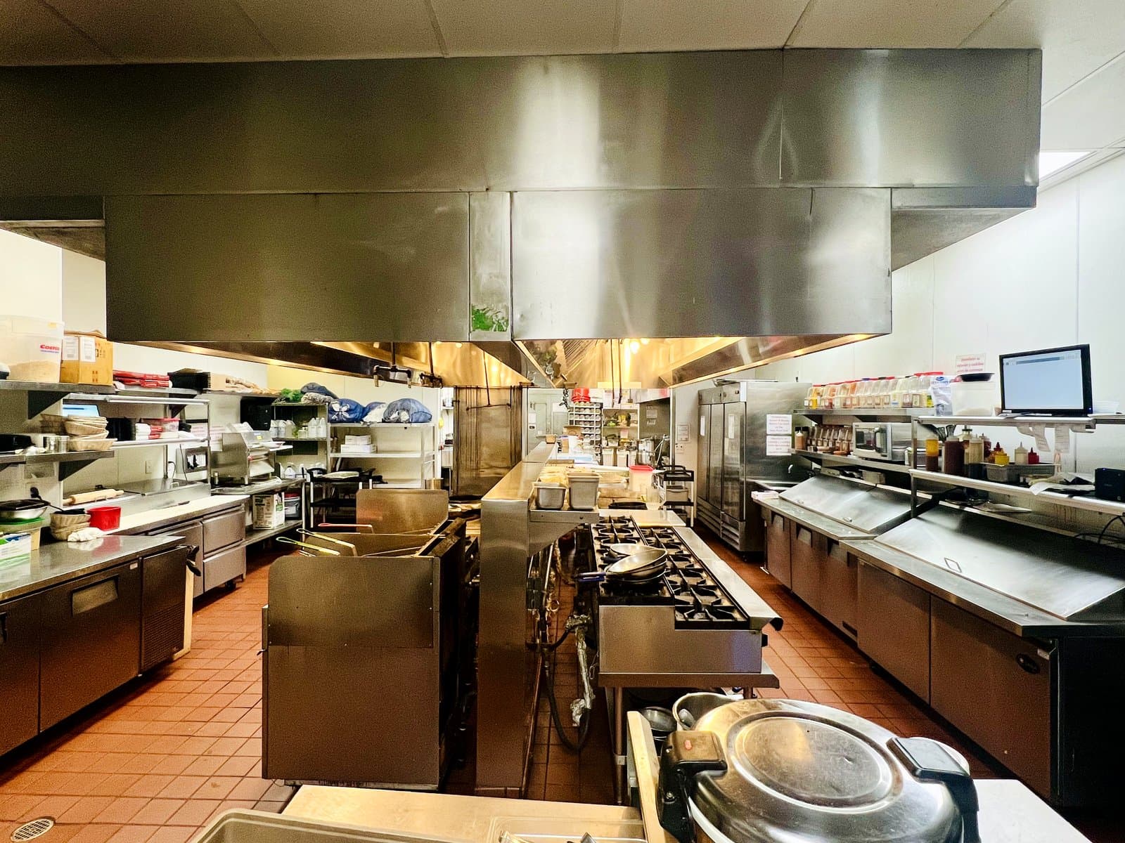 Prep stations and cooking line in the Mint Indian Bistro catering kitchen