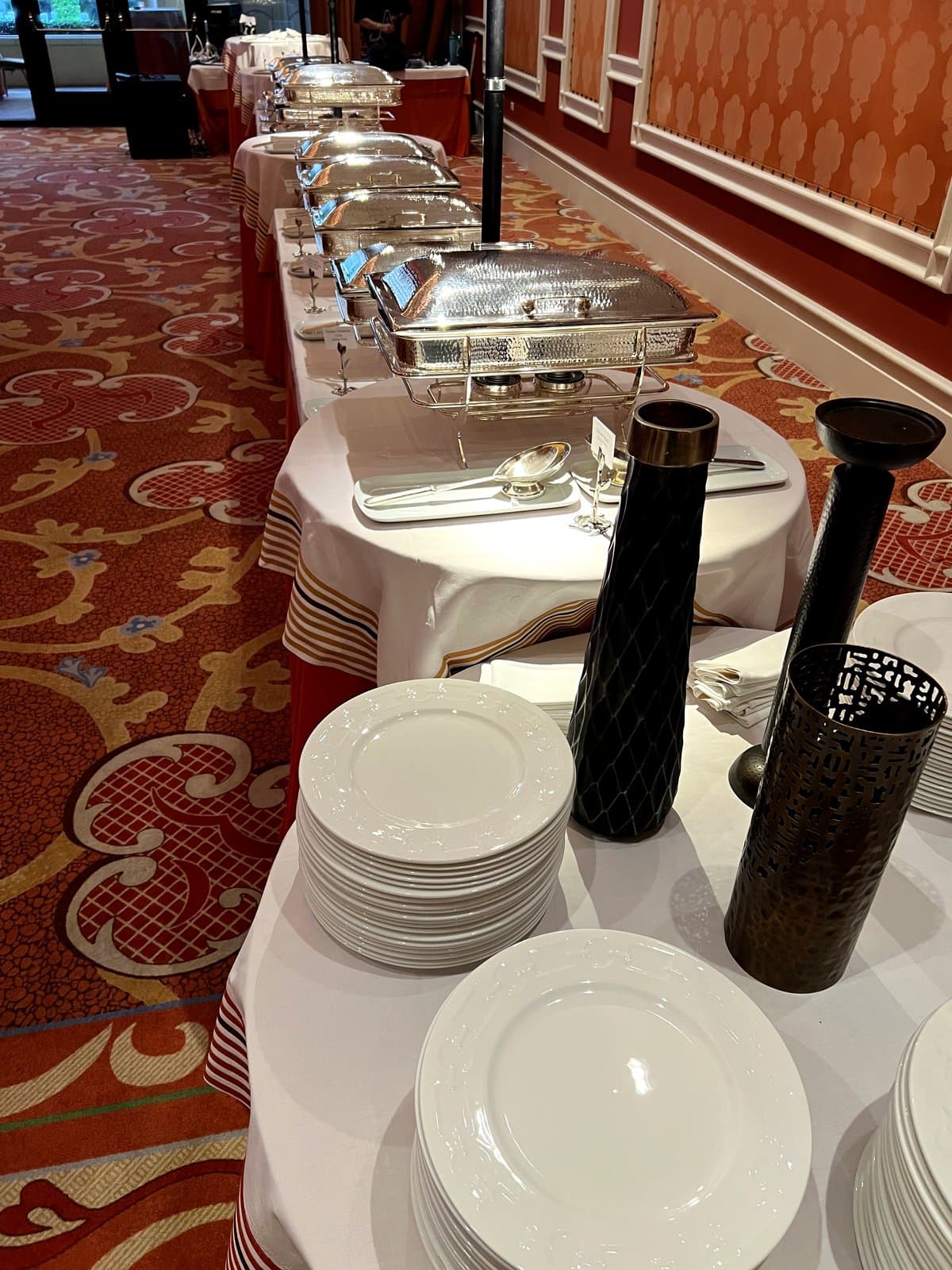 Elegant chafing dish buffet setup in a banquet hall by Mint Indian Bistro