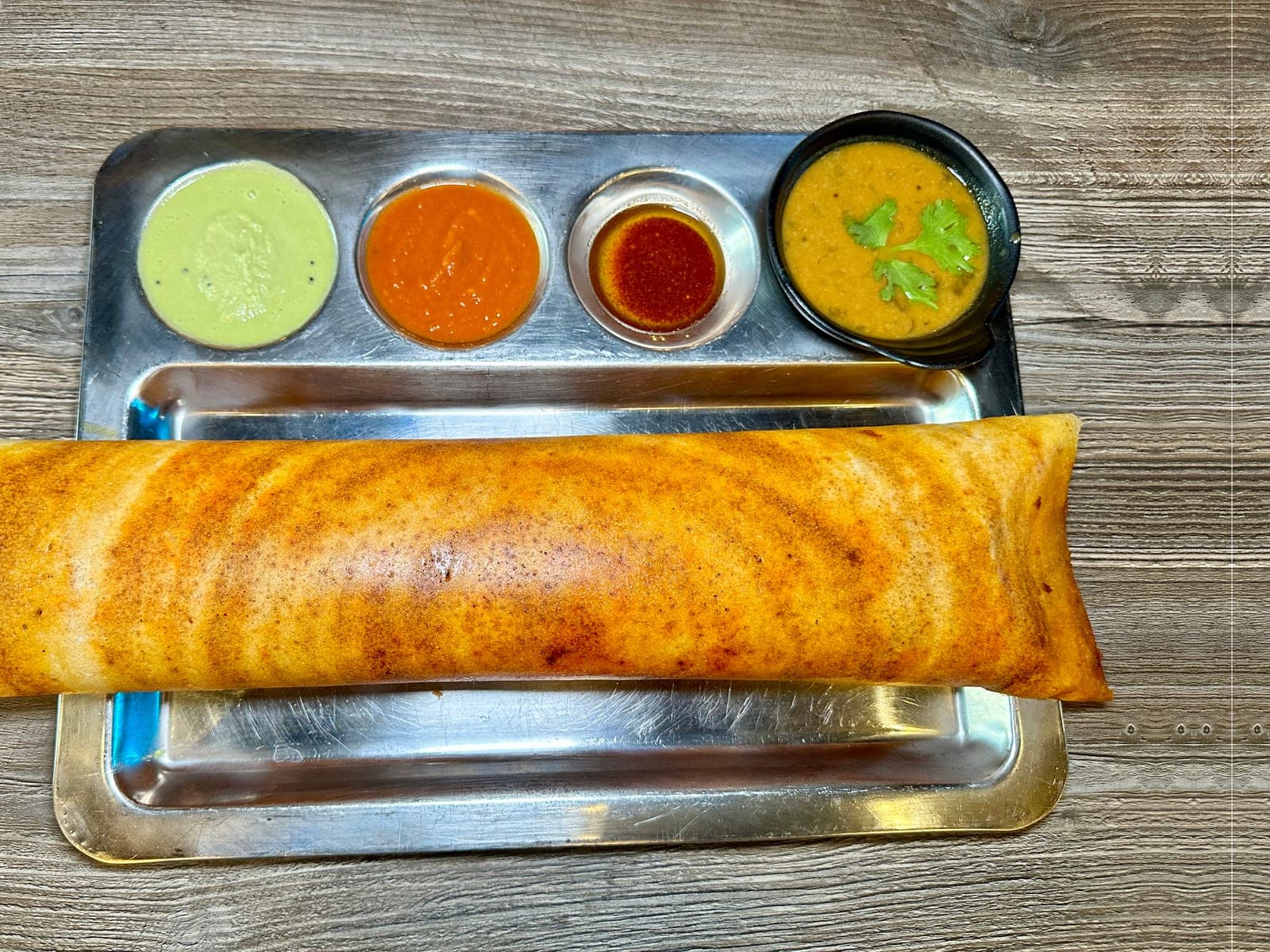 Masala dosa platter with chutneys and sambar at Mint Indian Bistro Las Vegas